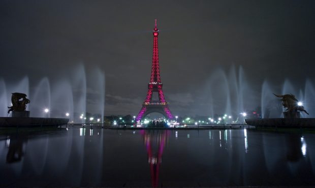 Eiffel tower at night on seine river