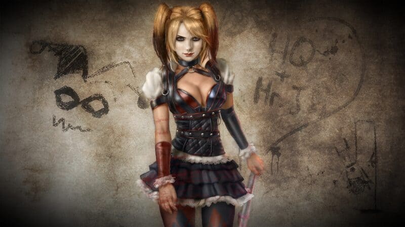 Wallpaper of a female character with a punk style, blonde hair, and a provocative outfit against a grunge wall background.