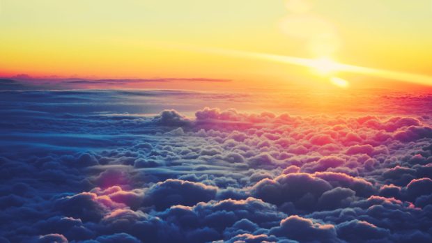 Sunset over clouds wallpaper 1920x1080.