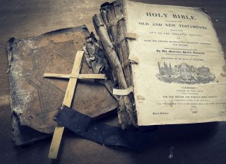 The holy bible old and new testaments and cross wide wallpaper.