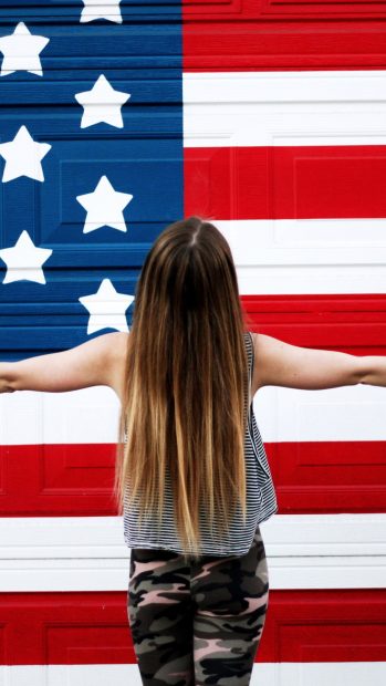 American Girl In Front Of USA Flag.