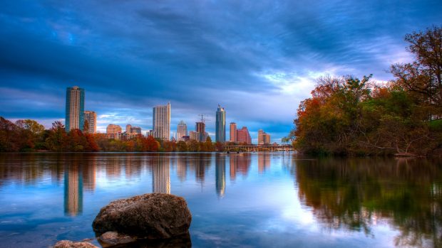 Austin texas river rocks beach trees reflection images.