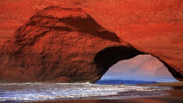 Woman on Beach by Red Cliffs of El Gezira