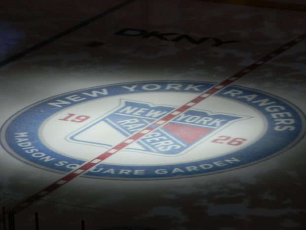 The Rangers logo featured on center ice at Madison Square Garden in New York.