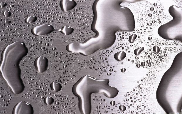 Water drops on silver surface wallpaper HD.