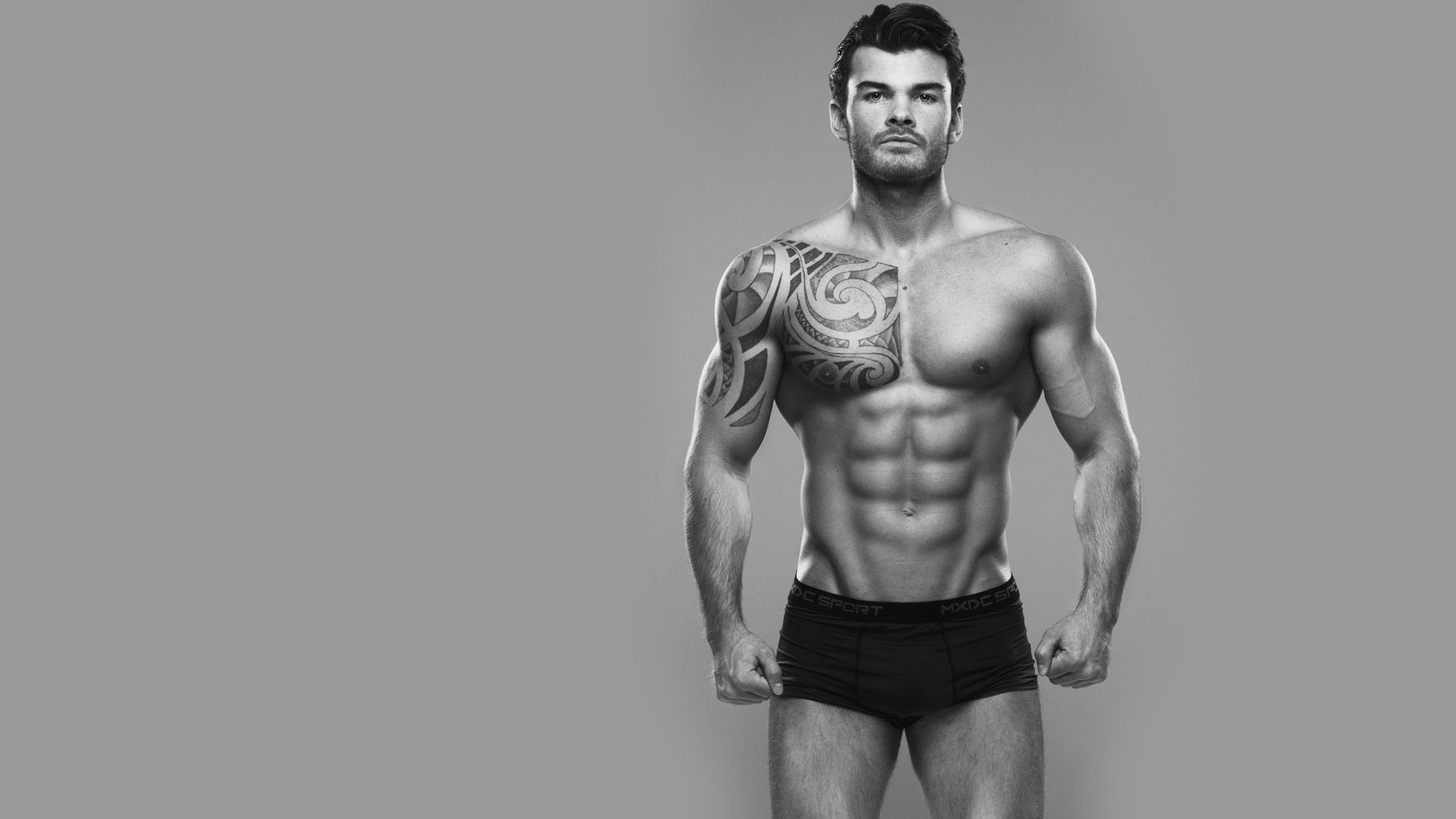 Builder Poses In A Dark Background, Body Builder Picture Background Image  And Wallpaper for Free Download