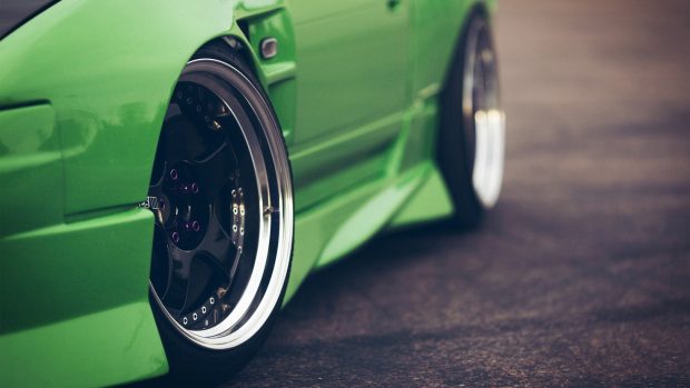 Green car unique wheels photo hd wallpaper.