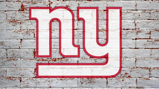 New york giants logo white red on grey brick.