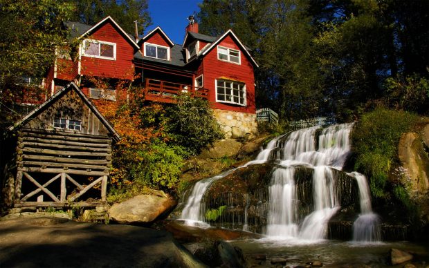 Red house next to the waterfall rock world 1920x1200 wallpapers.