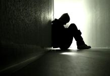 Sad alone boy wallpaper.