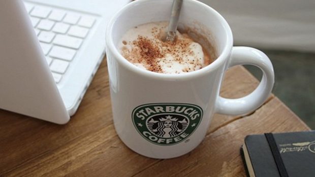 Table Starbucks Coffee And White Laptop.