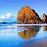 Beautiful Nature wallpaper rocks sand and sea.