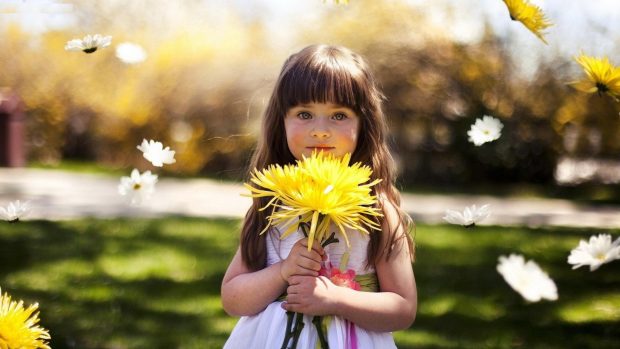 Cute Girl With Yellow Flower Best Wallpapers.