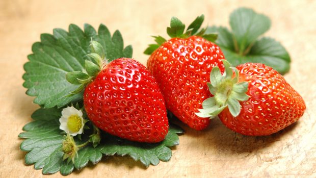 Cute Red Strawberry Fruit Wallpaper.