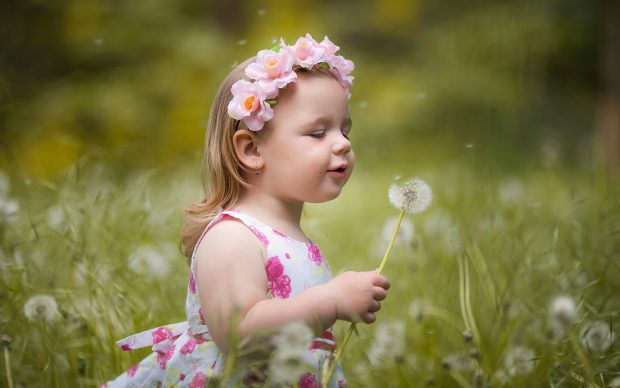 Cute baby girl with flowers pictures.