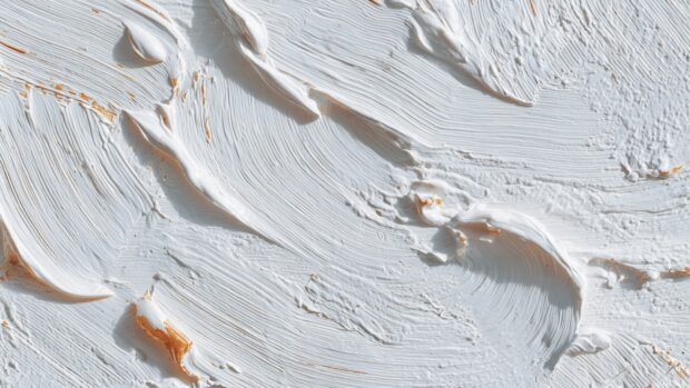 Stylish white background infused with artistic brush strokes, making your desktop visually striking yet clean.