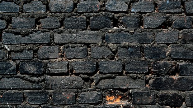 Backgrounds Masonry of black brick.