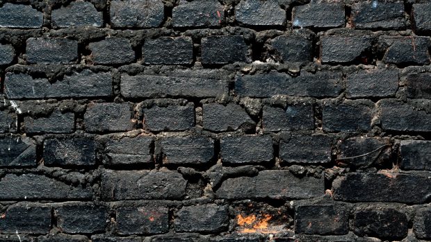 Backgrounds Masonry of black brick.