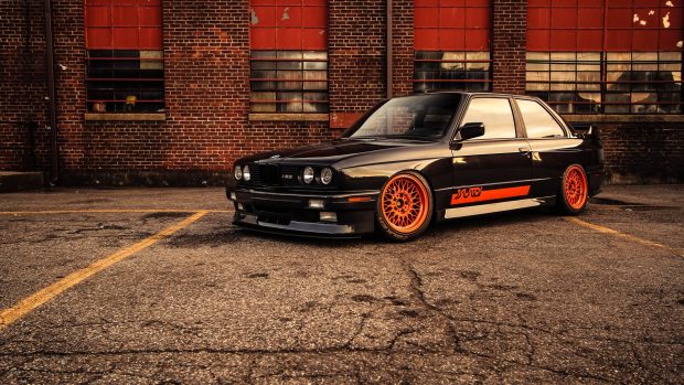 Black orange bmw m3 e30 brick building wide hd wallpaper.