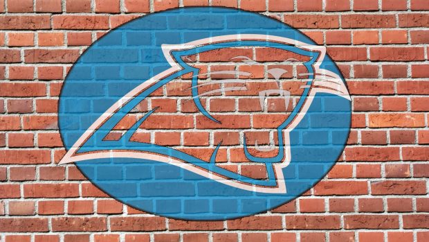 Carolina panthers logo on brick 1920x1080.