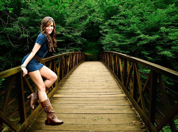 Cowgirl on a Bridge Wallpaper.