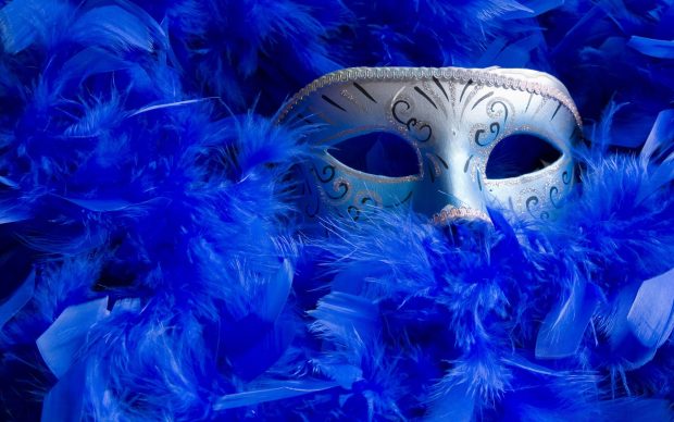 Creative Wallpaper Carnival mask with blue feathers Images.