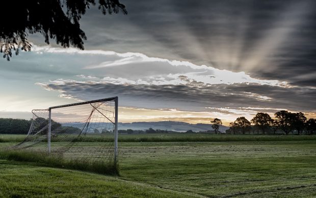 Field football grass sky cloud.