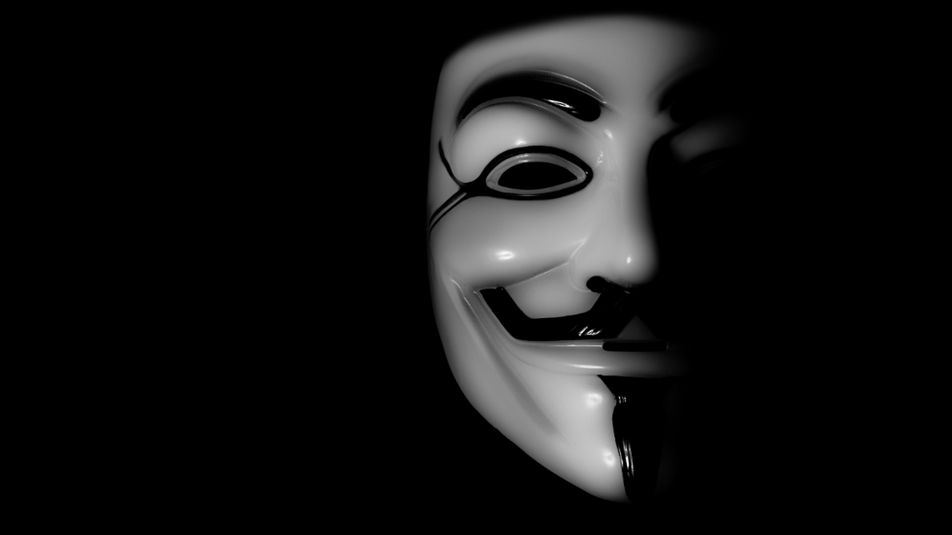 Маска на черном фоне. Фокс анонимус. Мемная маска Ананимуса.