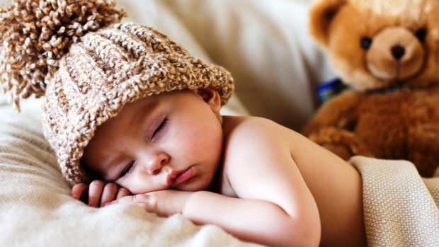 Sleeping new born baby nice pics.