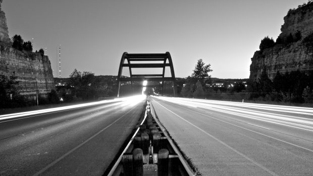 Time exposure photography of austin 360 bridge BW.