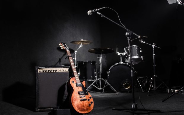 electric guitar image with drum set.