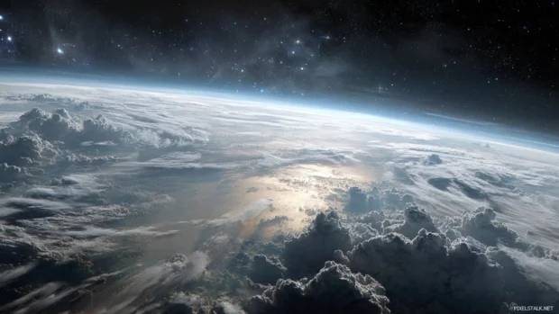 A beautiful Earth from space wallpaper that captures the majesty of our planet, with dramatic cloud formations and distant stars.