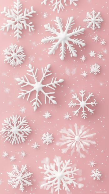 White snowflakes on pink background with Christmas design