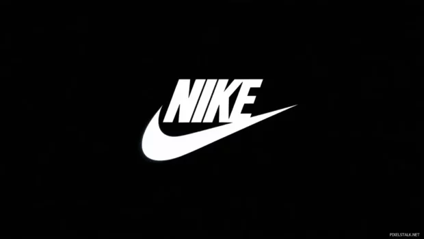 Nike logo wallpaper with a sleek black background, featuring bold white typography and minimalist design elements, ideal for modern desktop aesthetics.