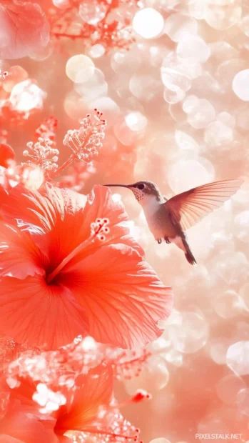 Delicate hummingbird hovering near a bright red hibiscus flower, wings blurred in motion, with a soft, bokeh background.