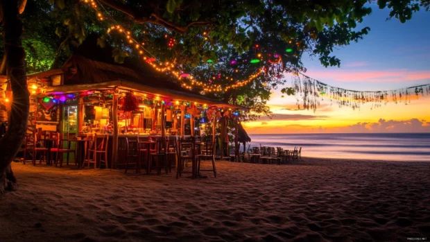 A beachside cafe overlooking the ocean at sunrise .