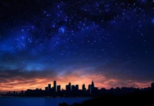A breathtaking night sky above a cityscape, with skyscrapers silhouetted against a starry backdrop, creating a contrast between nature and urban life.