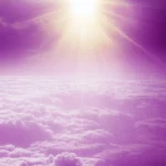 A breathtaking purple sky with a golden sun peeking through the clouds, casting a warm purple glow.
