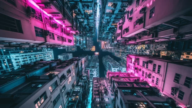 A bright Cyberpunk skyline featuring neon lit buildings and crowded roads under colorful lights.
