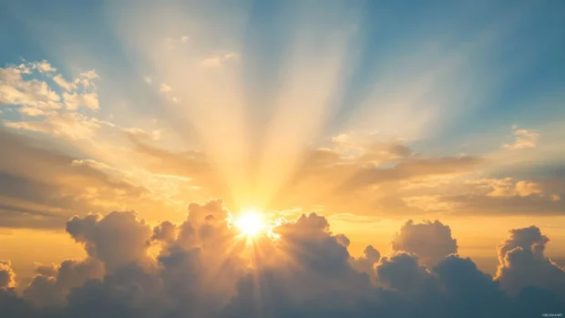 A canvas of scattered clouds welcomes the new day with radiant sunrise hues.