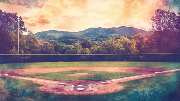 A dreamy watercolor style baseball field, soft pastel colors blending to create a peaceful artistic look .