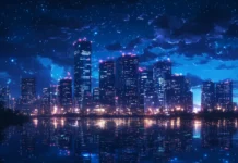 A glowing nightscape with downtown city lights highlighting the skyline.