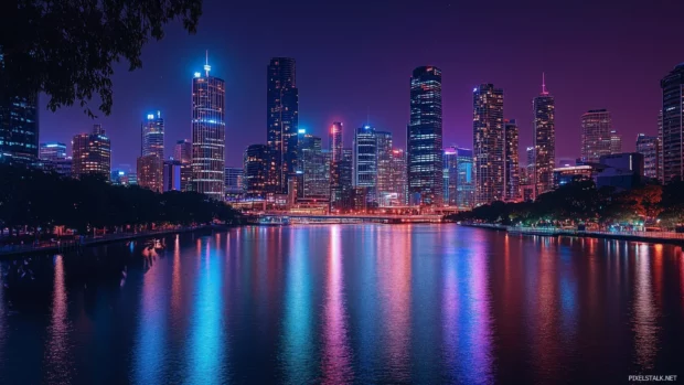 A modern city skyline at night, glowing with neon lights and reflections shimmering in a nearby river.