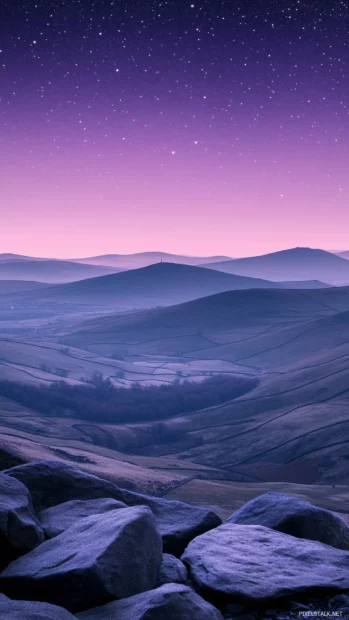 A pink sky fades to purple, stars emerge, night takes over.
