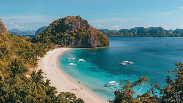 A pristine tropical beach with turquoise waters and white sand.