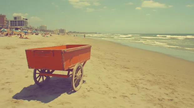 A retro style illustration of a beach scene, with vintage colors and a classic beach wagon .