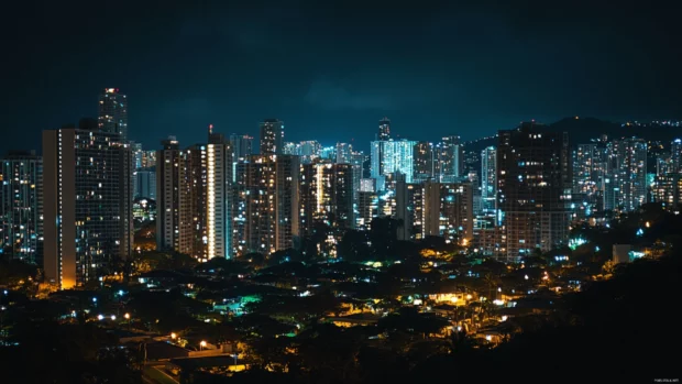 A vertical view of the Nighttime City skyscrapers.