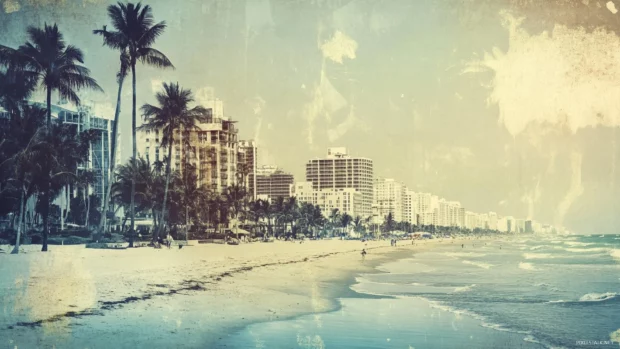 A vintage style photograph of Miami Beach, with faded colors and a grainy texture .