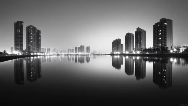 Black and white city wallpaper of an early morning urban skyline.