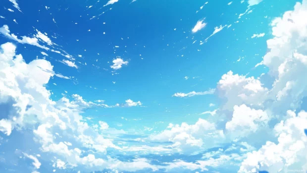 Blue sky with soft, fluffy white clouds scattered across.